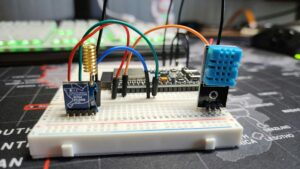 Arduino and LoRa components set up on a breadboard for a DIY project.